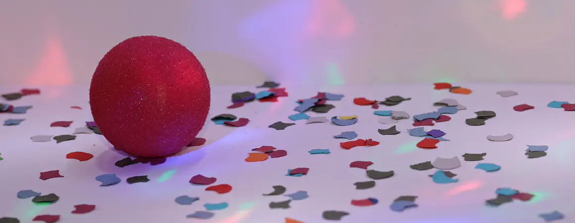 red nose on the floor with confetti