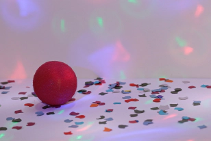 red nose on the floor with confetti