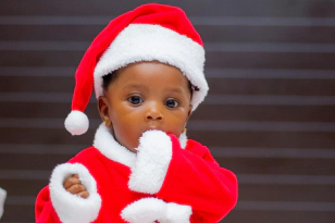 baby with christmas hat